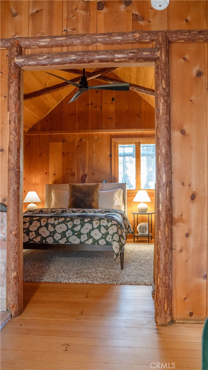 25201 Fern Valley Road Idyllwild, CA 92549 - Photo 20 of 34 a bedroom with a bed and a window