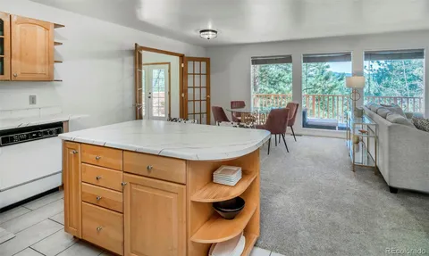 a living room with furniture and windows