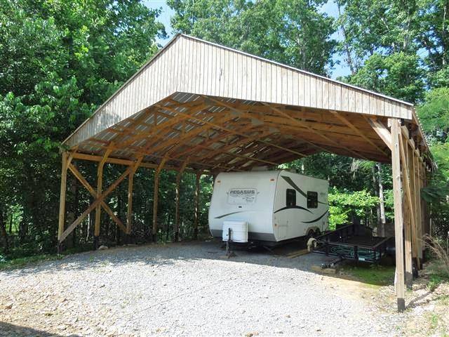 680 Edenway Road Dover, TN 37058 - Photo 4 of 20 Large 28'x36' carport w/Truss roof. Great for camper, motor home, or pontoon boat.
