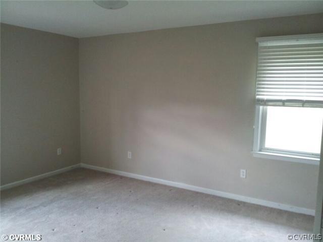 19705 Carson Ruritan Road Carson, VA 23830 - Photo 6 of 7 an empty room with a window