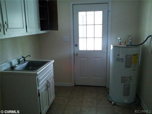 19705 Carson Ruritan Road Carson, VA 23830 - Photo 7 of 7 a utility room with closet dryer and washer