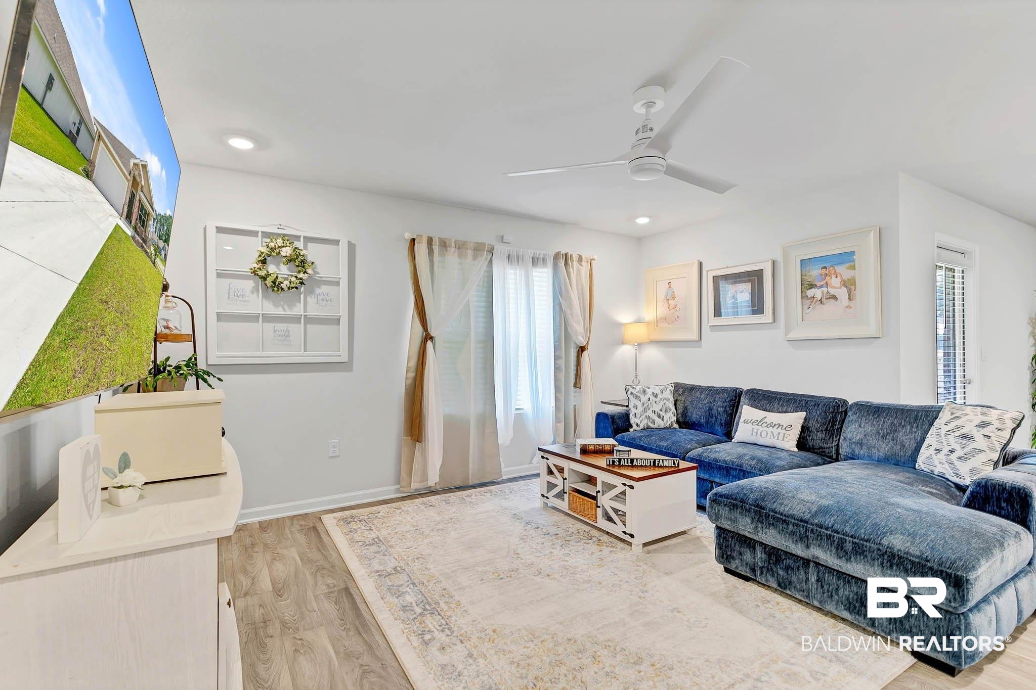 17217 REFLECTION Street Loxley, AL 36551 - Photo 7 of 83 Great room has a. new ceiling fan