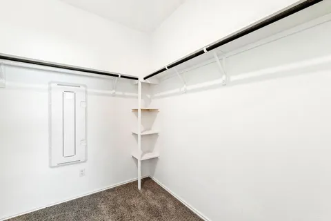 a view of small space with racks on the wall