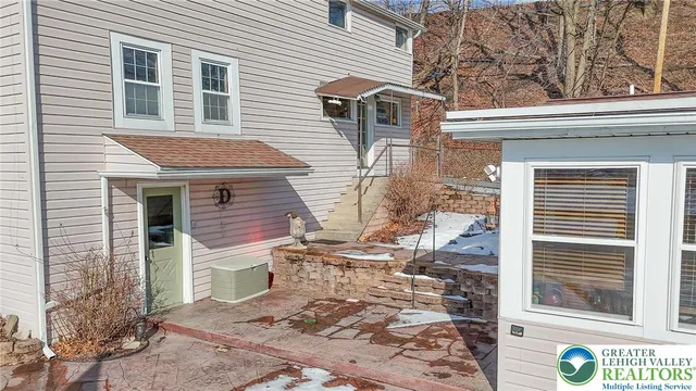 a front view of a house with parking