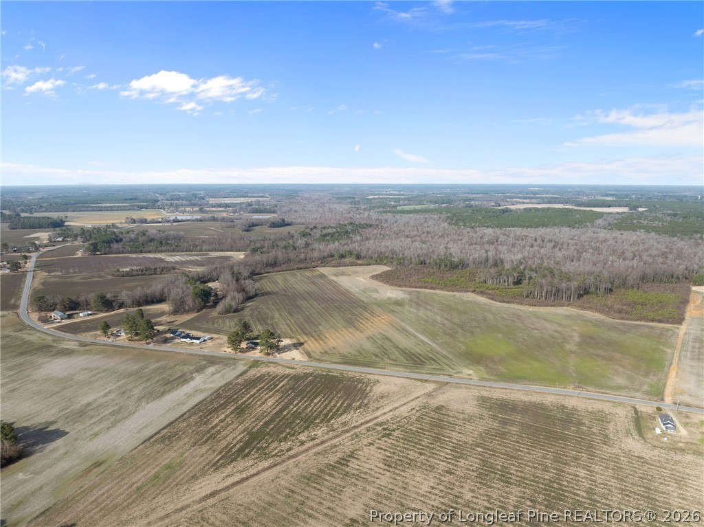 2876 Dunn Road Roseboro, NC 28382 - Photo 4 of 22 a view of a lake with a city