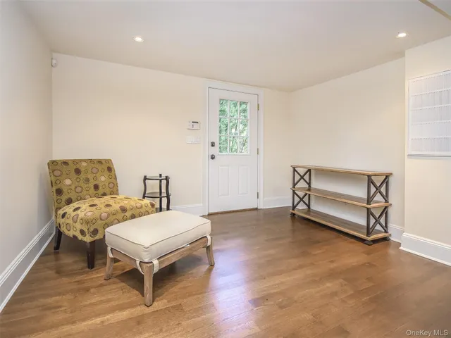 a bedroom with a bed and a table