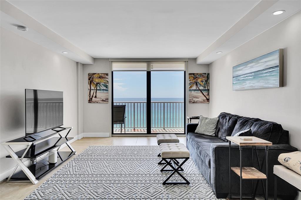 400 North Surf Road, Unit 703 Hollywood, FL 33019 - Photo 30 of 50 a living room with furniture and a window