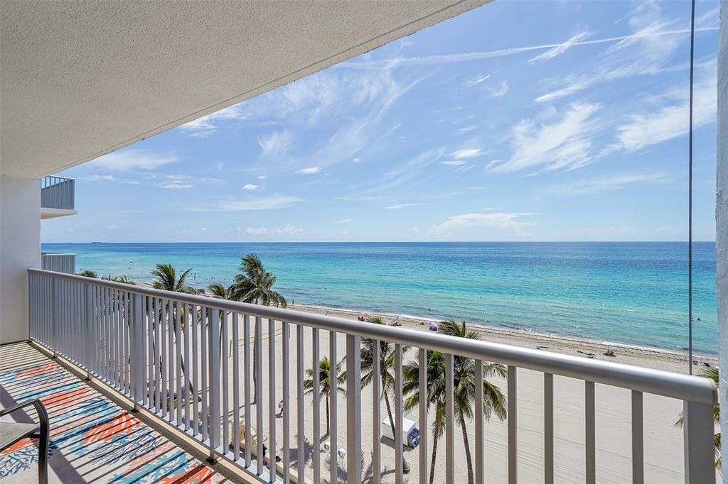400 North Surf Road, Unit 703 Hollywood, FL 33019 - Photo 9 of 50 a balcony with an ocean view