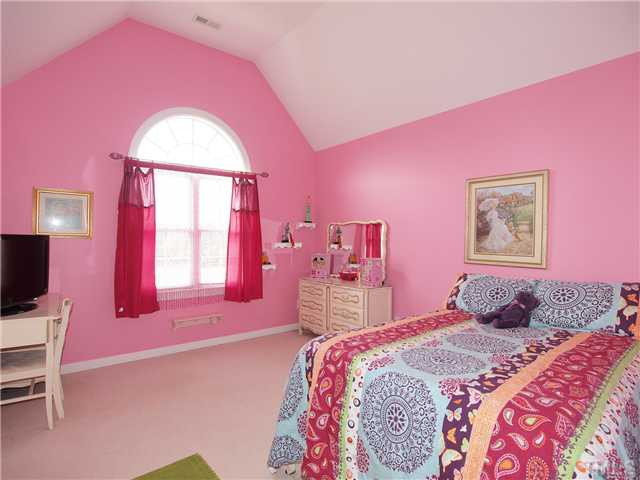 8209 Buffaloe Road Raleigh, NC 27616 - Photo 11 of 18 ADORABLE Bedrooms upstairs are very LARGE. Plenty of room to display or tuck away those precious belongings. Bedroom