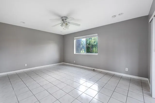 a view of an empty room and window