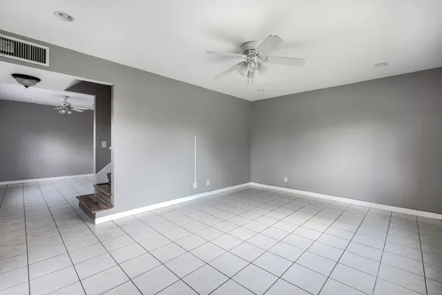 a view of an empty room and window