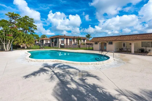 a view of a house with a swimming pool