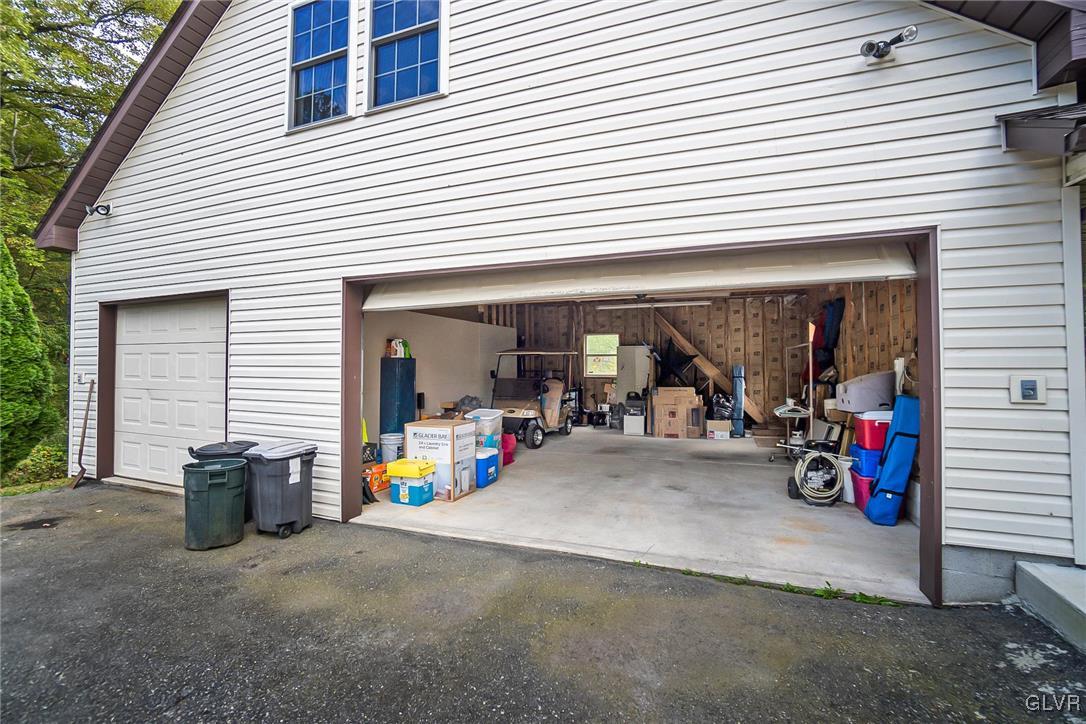 115 Pine Cove Court Lehighton, PA 18235 - Photo 18 of 49 a view of a storage house with many windows