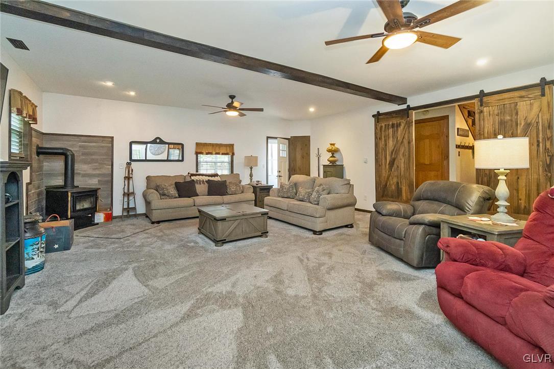 115 Pine Cove Court Lehighton, PA 18235 - Photo 35 of 49 a living room with furniture and a large window