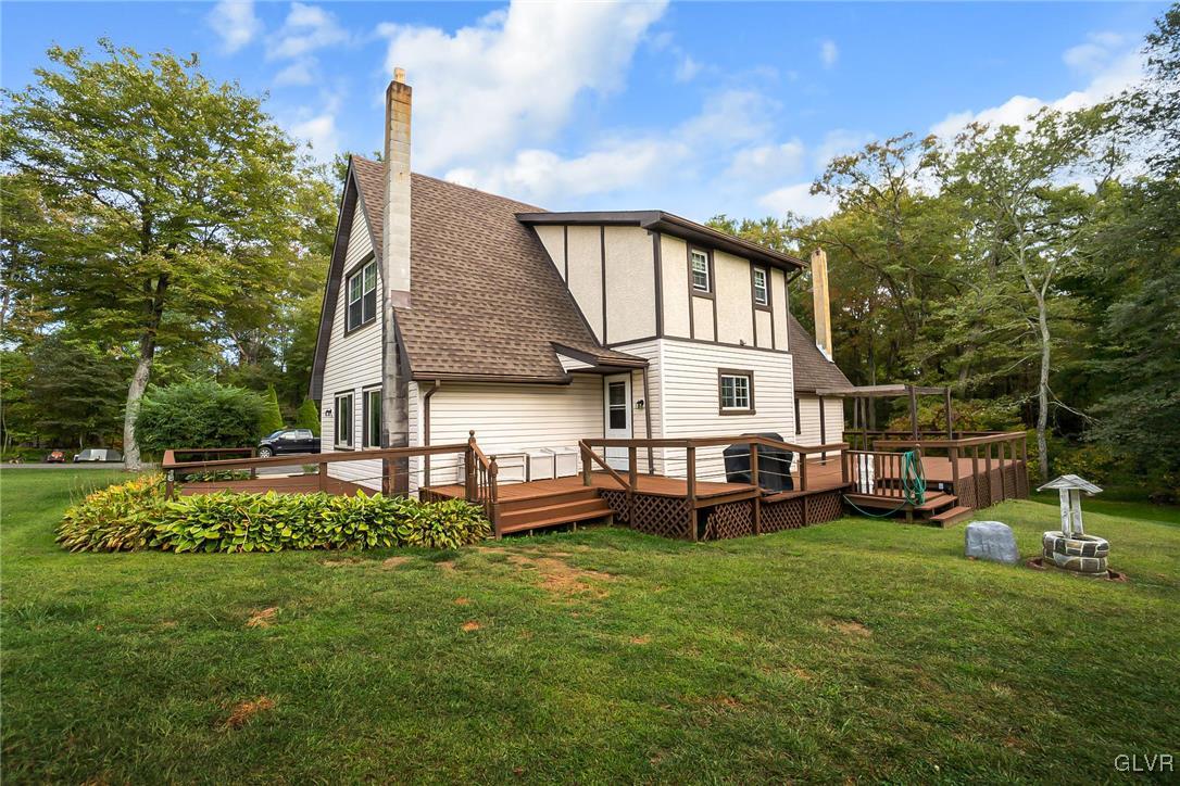 115 Pine Cove Court Lehighton, PA 18235 - Photo 6 of 49 a front view of house with yard and outdoor seating
