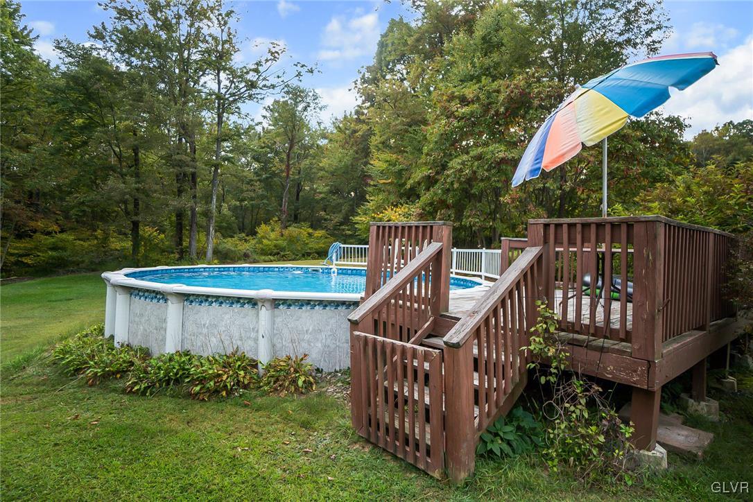 115 Pine Cove Court Lehighton, PA 18235 - Photo 7 of 49 a view of a deck with a yard