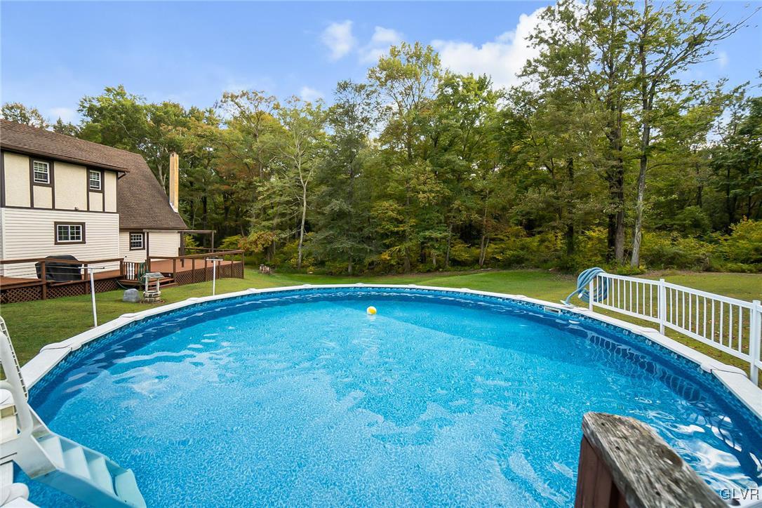 115 Pine Cove Court Lehighton, PA 18235 - Photo 8 of 49 a view of a swimming pool with a patio