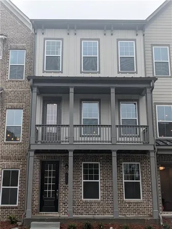 a view of building with large windows