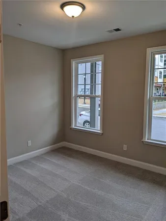 an empty room with windows