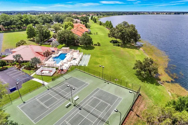 an aerial view of a house with a ocean view