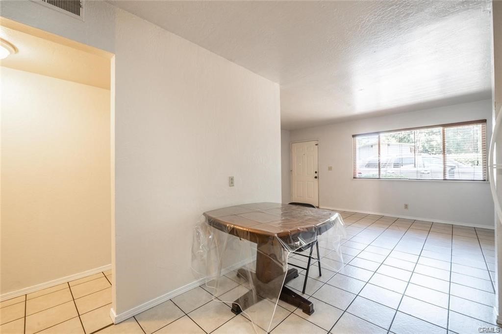 609 Rancheria Drive Chico, CA 95926 - Photo 14 of 60 a view of a room that has a table and chair in it