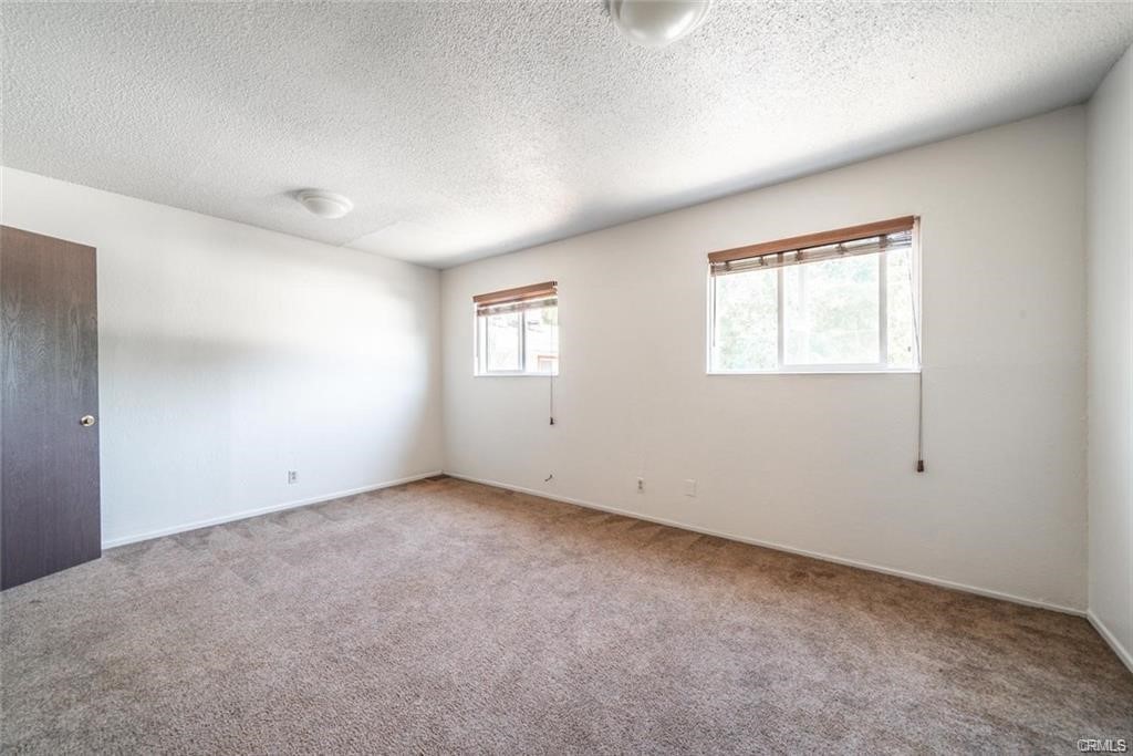 609 Rancheria Drive Chico, CA 95926 - Photo 21 of 60 an empty room with windows