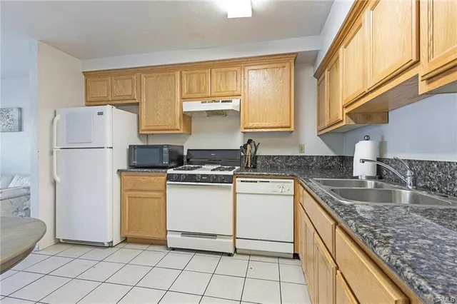 a view of a hallway with a bathroom