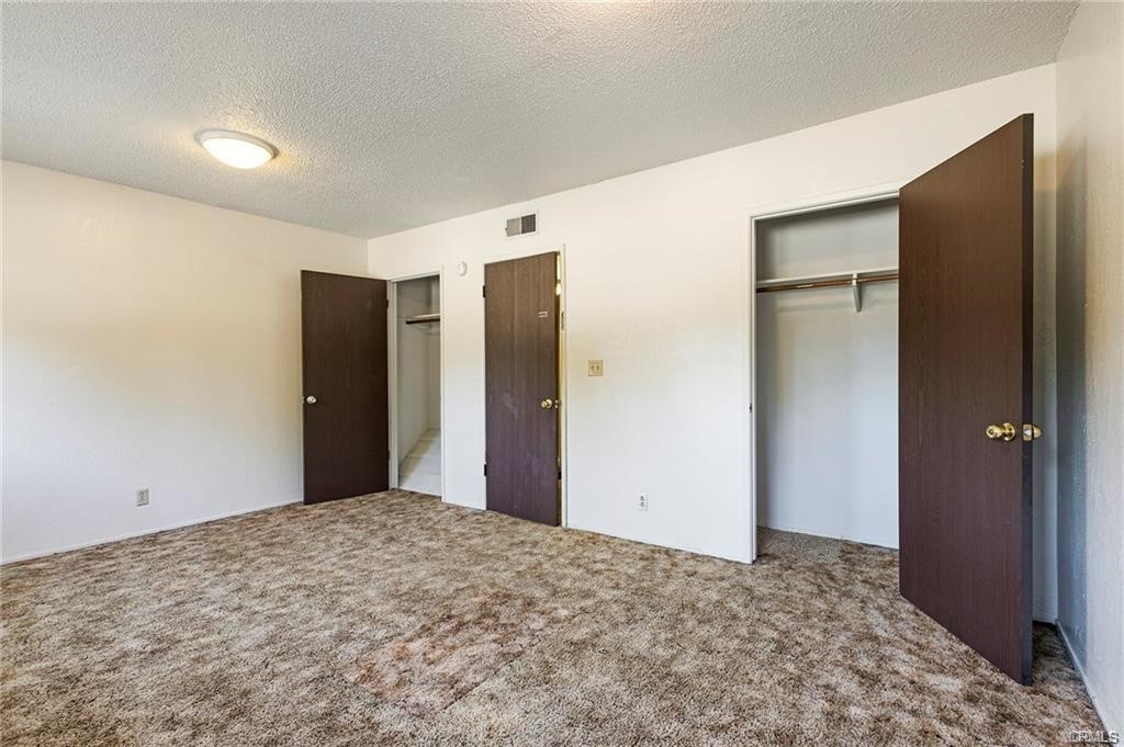 609 Rancheria Drive Chico, CA 95926 - Photo 39 of 60 a view of a big room with closet and windows
