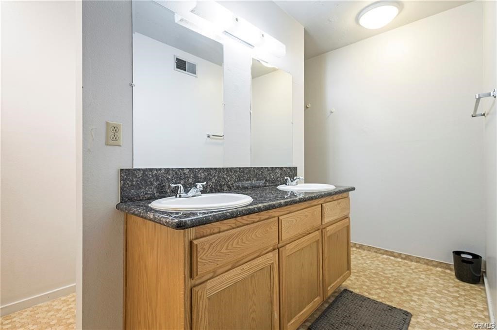 609 Rancheria Drive Chico, CA 95926 - Photo 41 of 60 a bathroom with a sink and a mirror