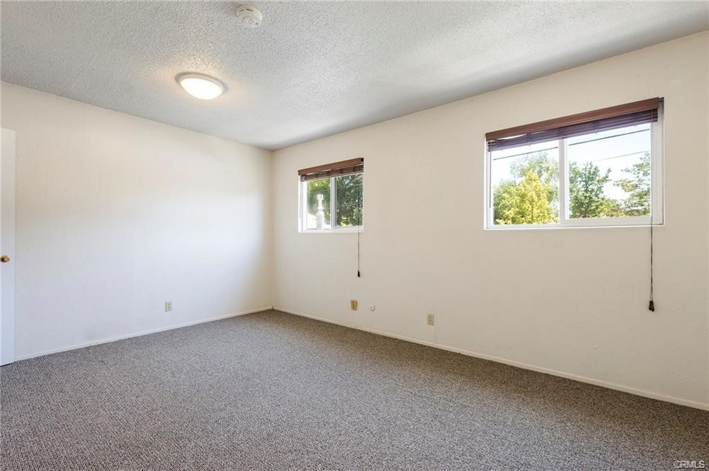 609 Rancheria Drive Chico, CA 95926 - Photo 51 of 60 an empty room with windows