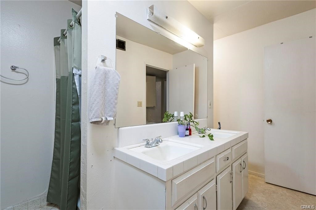 609 Rancheria Drive Chico, CA 95926 - Photo 55 of 60 a bathroom with a sink and a mirror