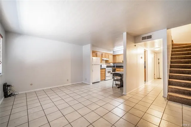 a view of a kitchen with a sink