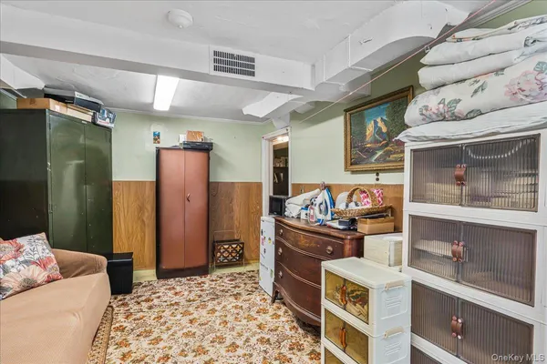 a bathroom with a toilet and a shower curtain