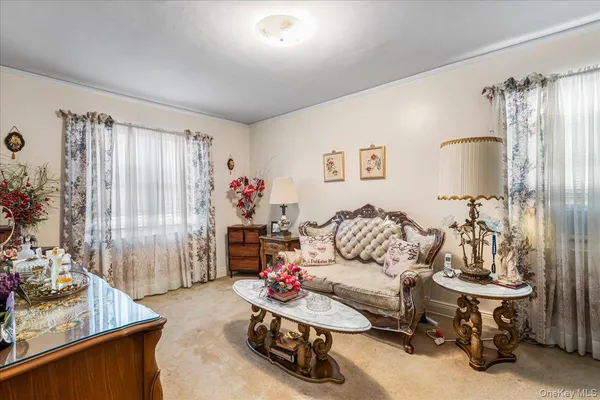 a room with furniture and gym equipment