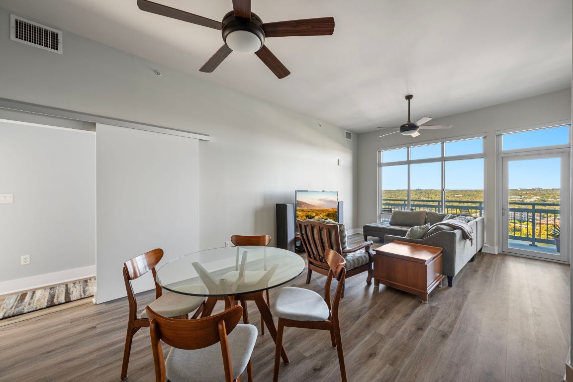 603 Davis Street, Unit 2009 Austin, TX 78701 - Photo 11 of 37 a living room with furniture and a large window