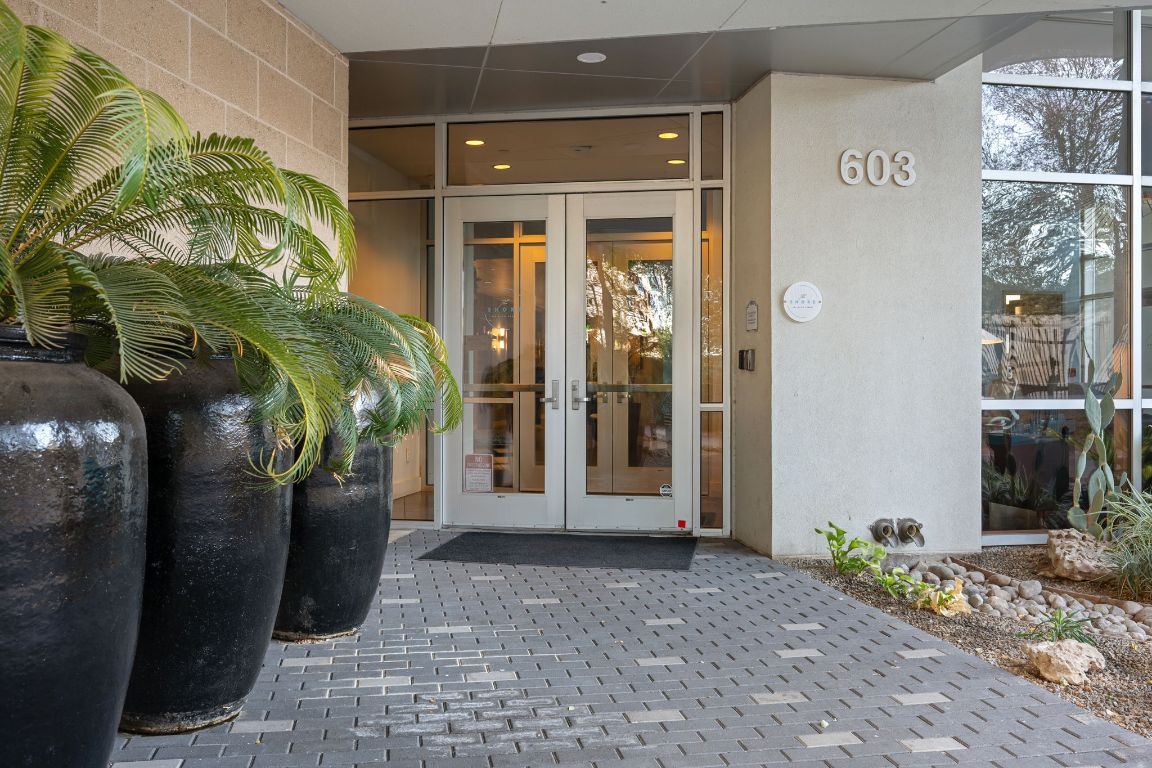603 Davis Street, Unit 2009 Austin, TX 78701 - Photo 2 of 37 a view of a path along with potted plants