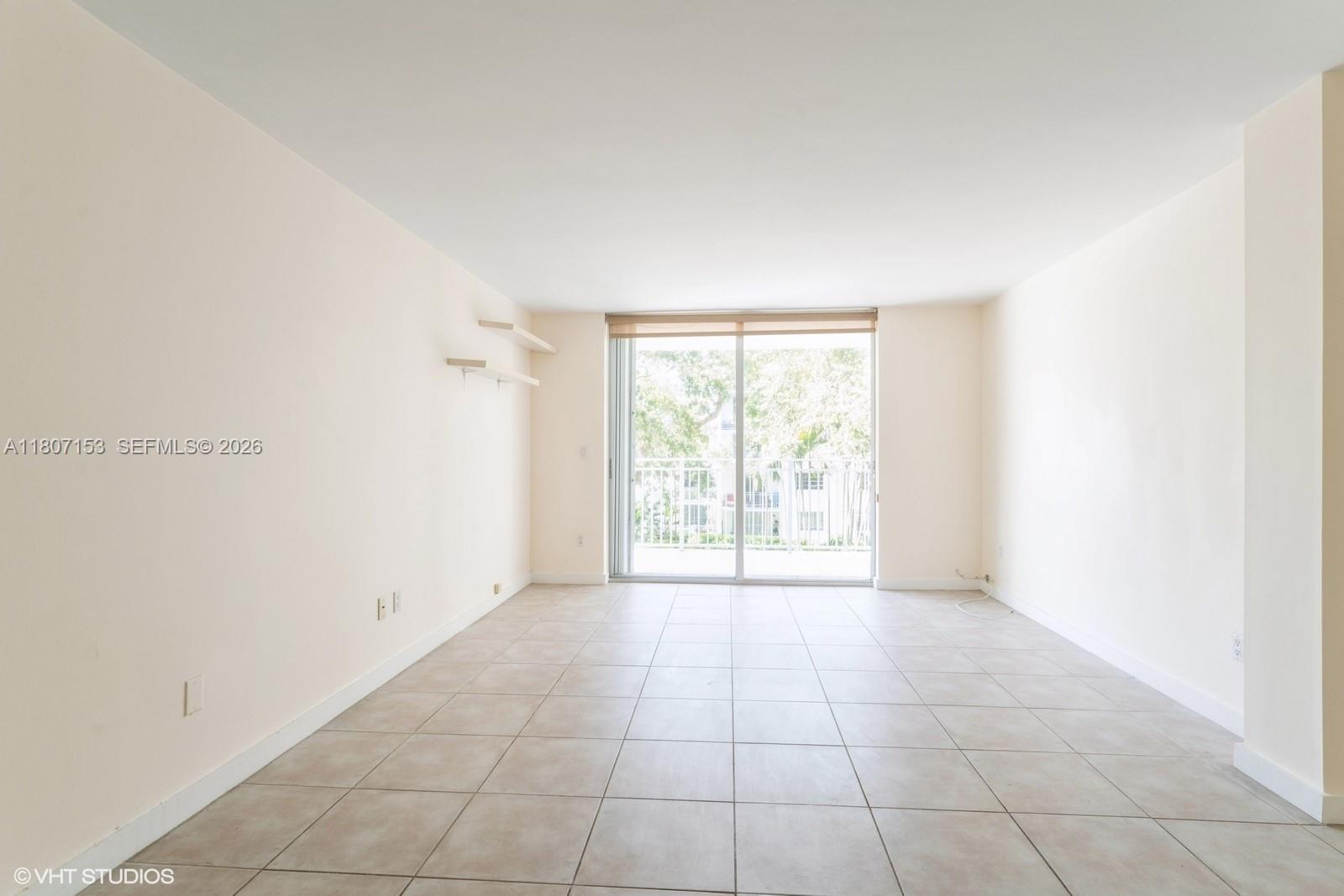 750 Northeast 64th Street, Unit B308 Miami, FL 33138 - Photo 16 of 25 a view of an empty room with a window