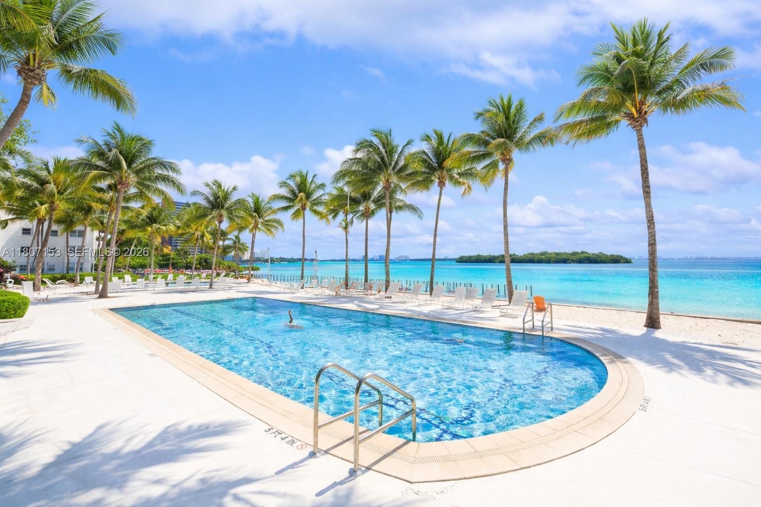 750 Northeast 64th Street, Unit B308 Miami, FL 33138 - Photo 3 of 25 a view of outdoor space with swimming pool
