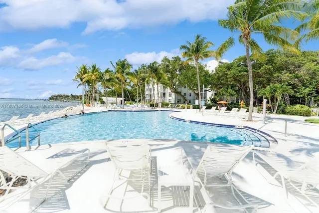 a view of a swimming pool with an outdoor space
