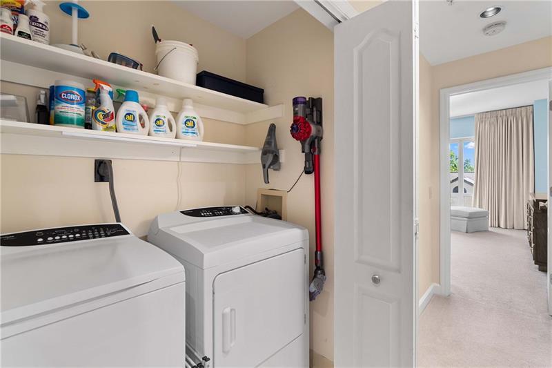 3475 Oak Valley Road Northeast, Unit 470 Atlanta, GA 30326 - Photo 21 of 34 a utility room with dryer and washer