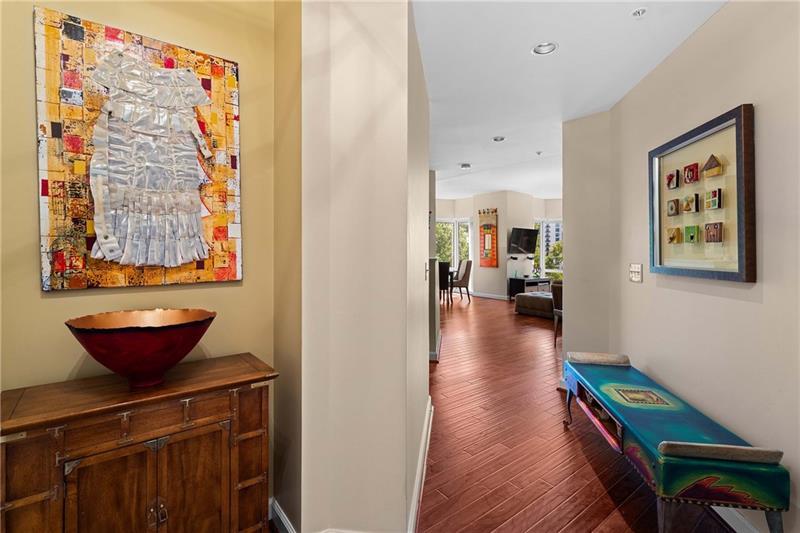 3475 Oak Valley Road Northeast, Unit 470 Atlanta, GA 30326 - Photo 22 of 34 a view of living room filled with furniture and wooden floor