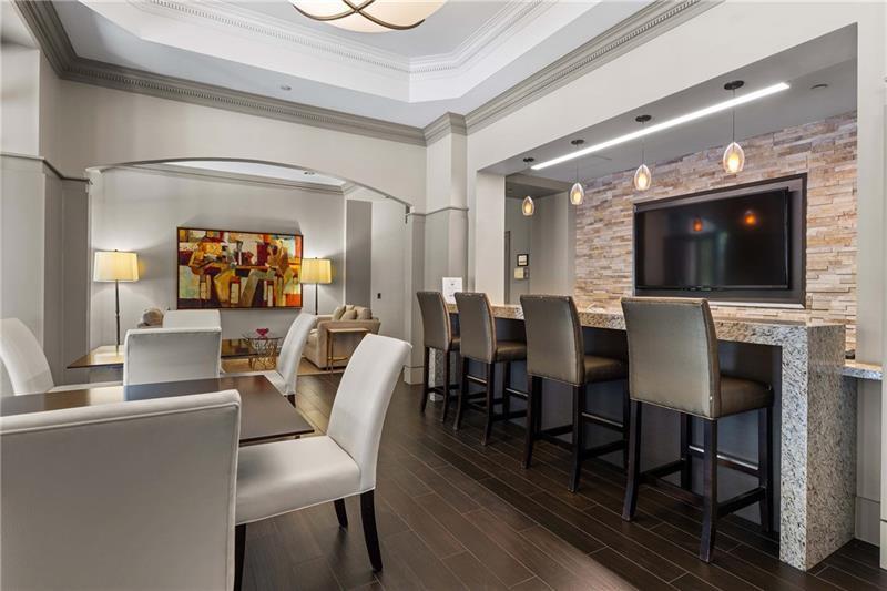 3475 Oak Valley Road Northeast, Unit 470 Atlanta, GA 30326 - Photo 29 of 34 a view of a dining room with furniture