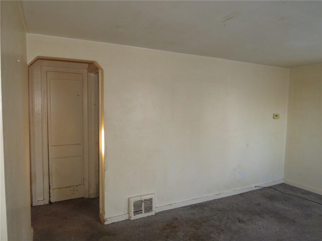 1252 Brinton Road Pittsburgh, PA 15221 - Photo 4 of 35 an empty room with windows
