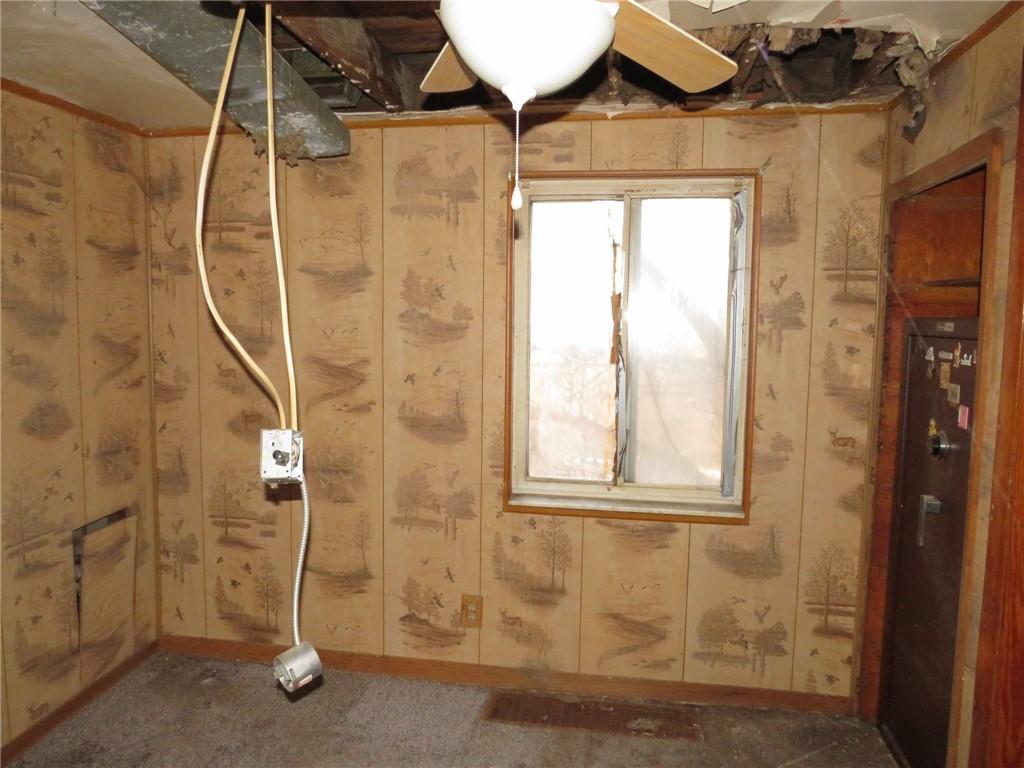 1252 Brinton Road Pittsburgh, PA 15221 - Photo 9 of 35 a bathroom with a window and a shower