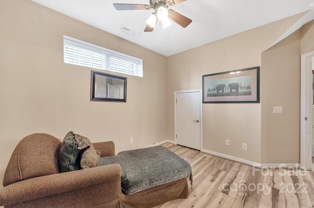 584 6th Baxter Crossing Fort Mill, SC 29708 - Photo 20 of 21 a living room with furniture and a window