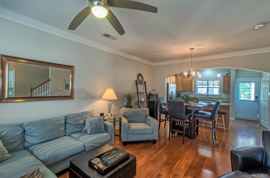 4136 Walker Road Charlotte, NC 28211 - Photo 2 of 15 a living room with furniture and wooden floor