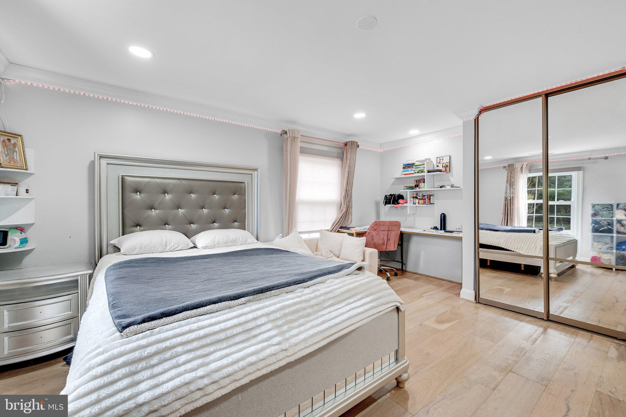 10904 Gainsborough Road Potomac, MD 20854 - Photo 11 of 32 Serene bedroom with modern elegance.