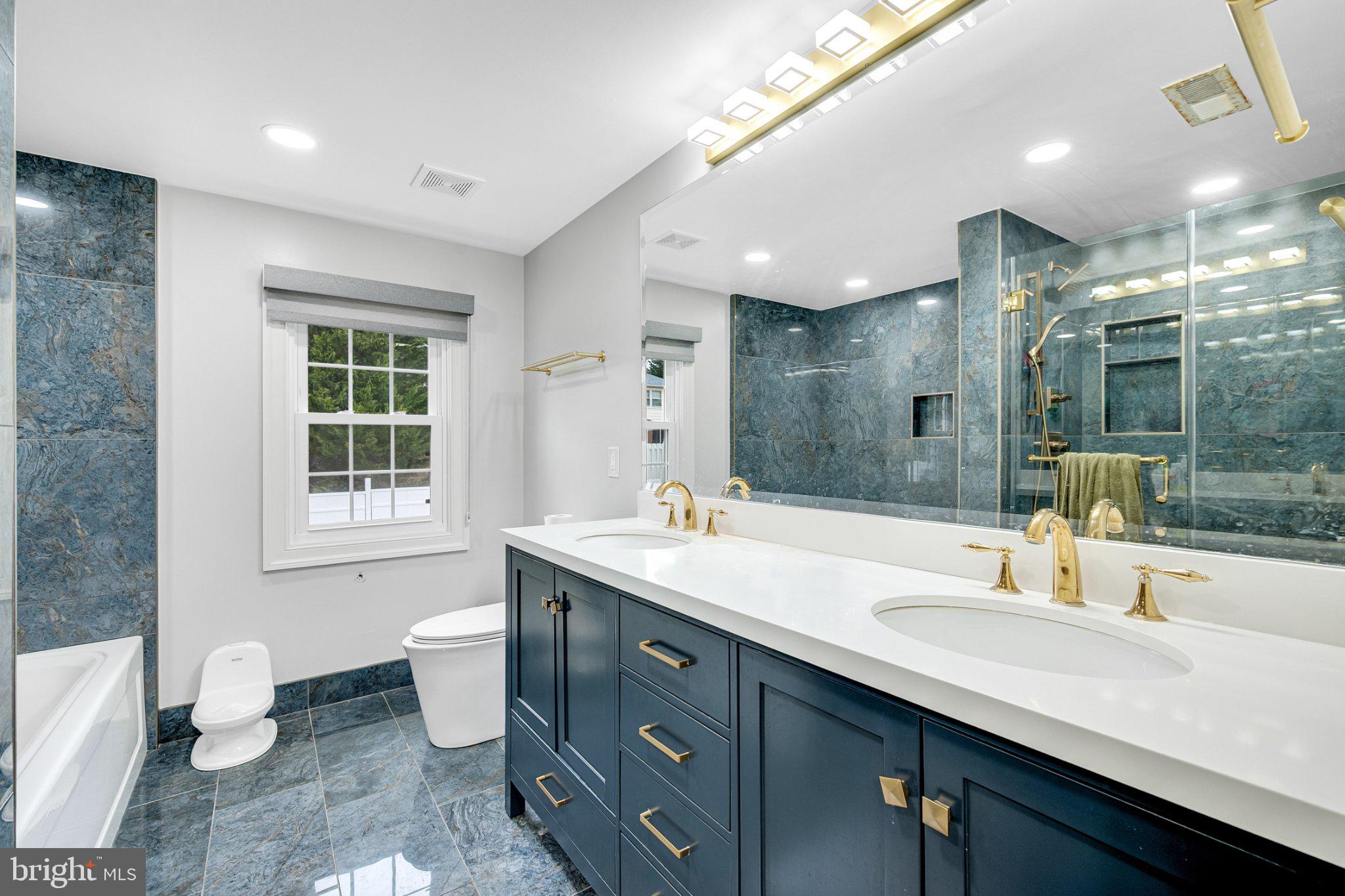 10904 Gainsborough Road Potomac, MD 20854 - Photo 13 of 32 Elegant bathroom with modern finishes.