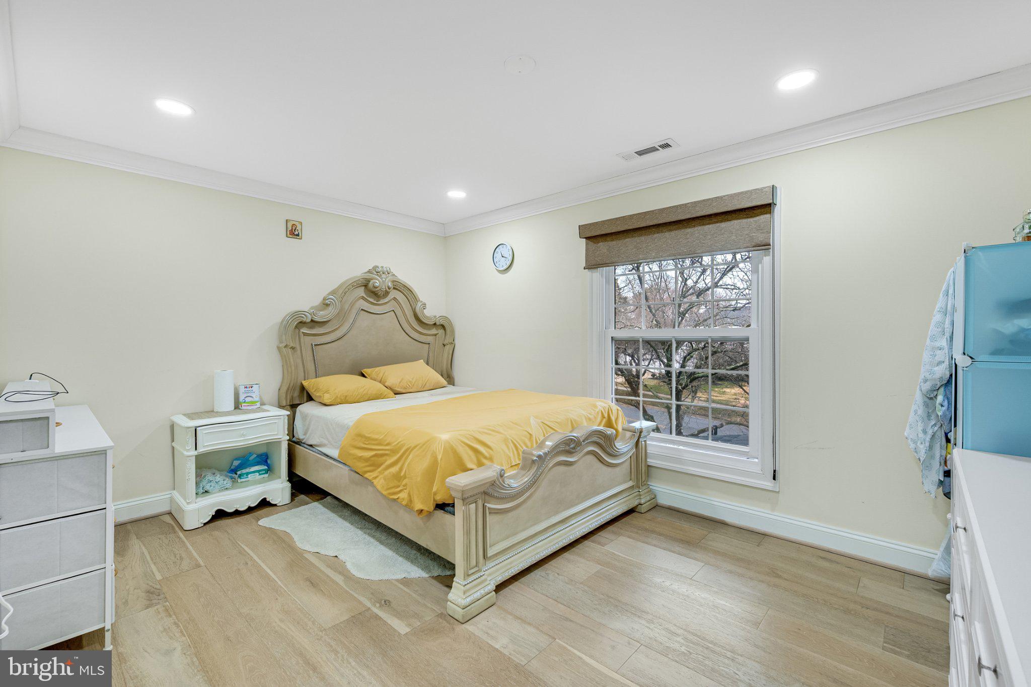 10904 Gainsborough Road Potomac, MD 20854 - Photo 15 of 32 Serene bedroom with natural light.