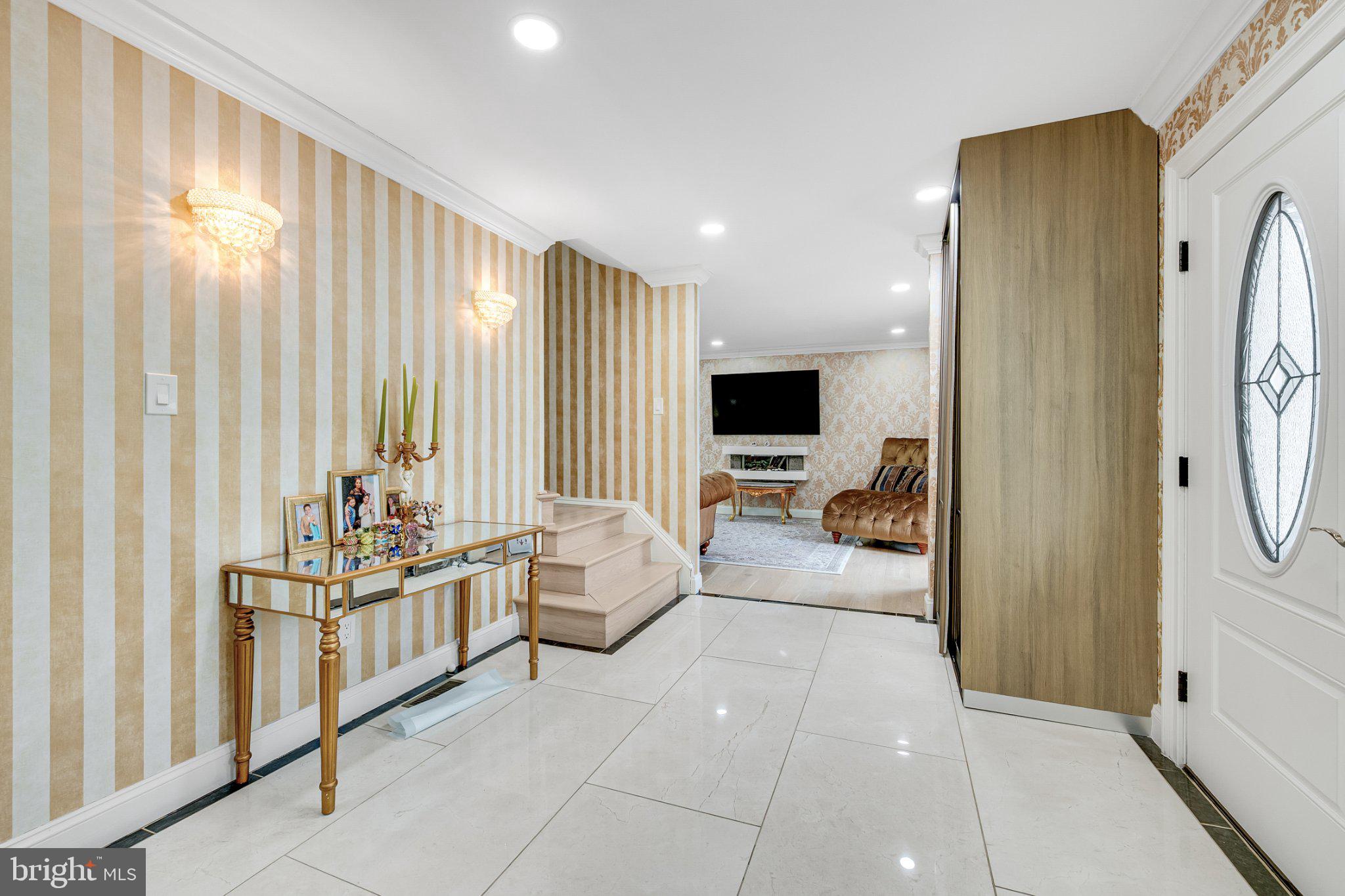 10904 Gainsborough Road Potomac, MD 20854 - Photo 17 of 32 Elegant entryway with stylish decor.